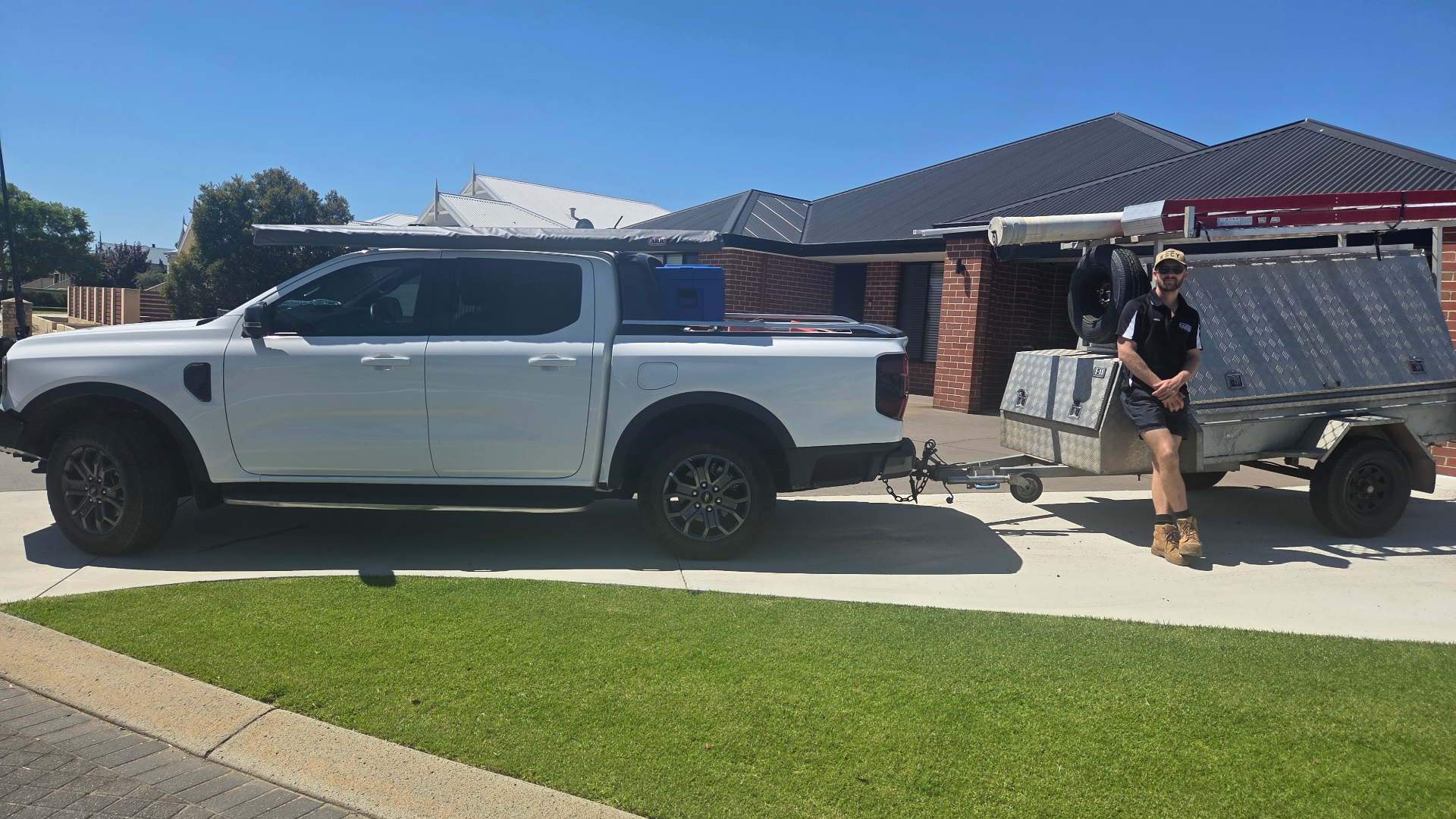 Mitch with the Australind Security & Electrical ute and trailer